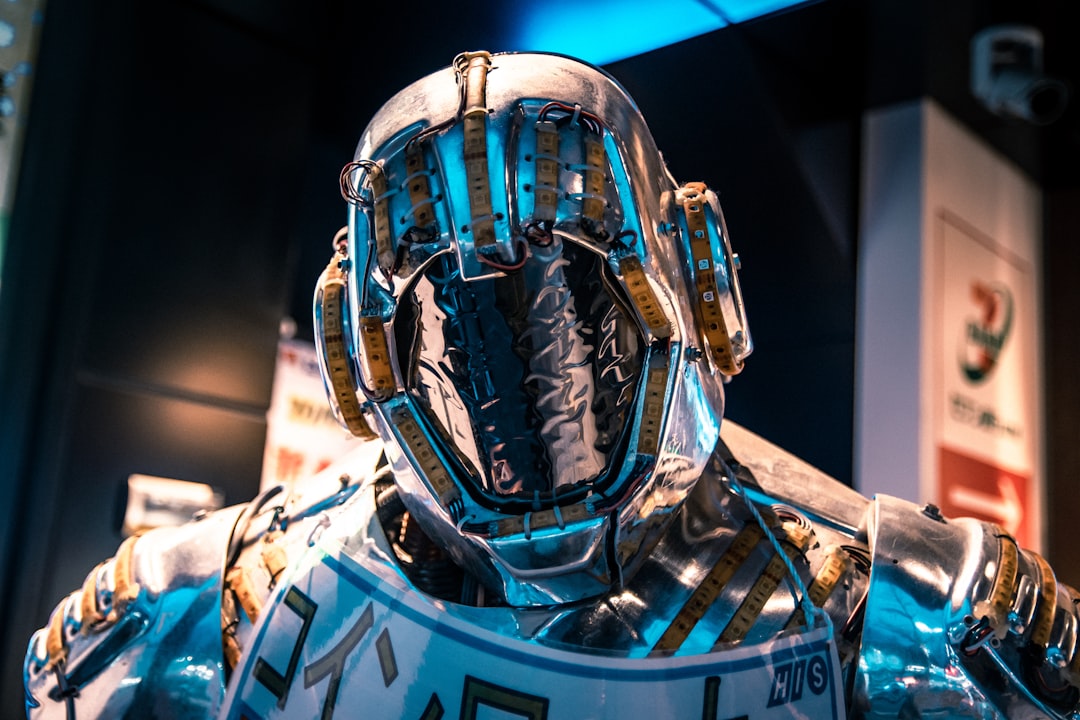 blue and black helmet on blue and white textile